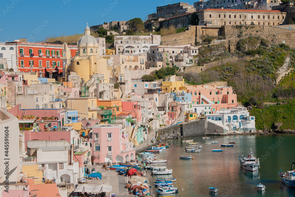 View on the harbor in the lovely bay of Procida island. Beautiful island near Naples, Italy.