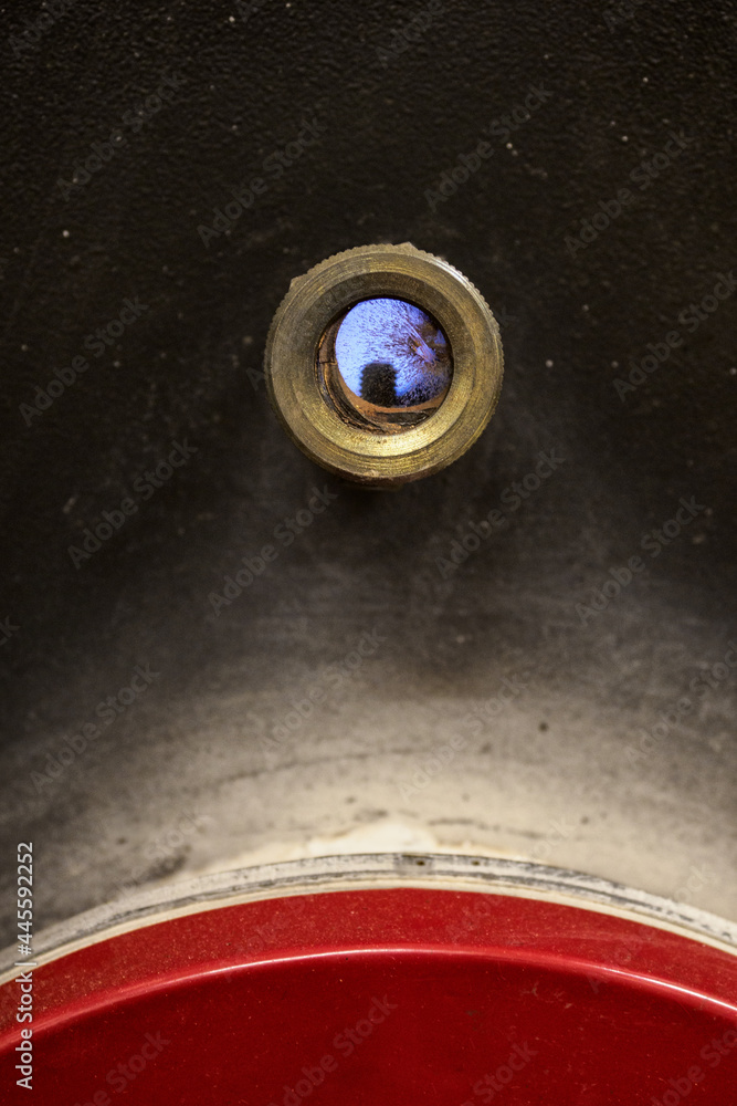 Burning flames in an industrial boiler for water heating. Burning flames in an industrial boiler for water heating.