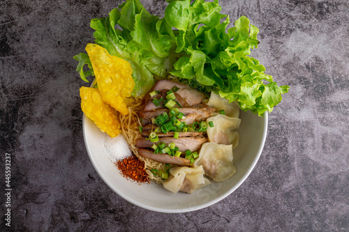 Bowl of wonton egg noodle with Grilled pork topping without soup