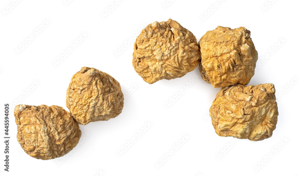 Dried Maca roots isolated on white background, top view Dried Maca roots isolated on white background, top view