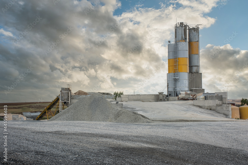 Obraz premium Quarry aggregate with heavy duty machinery.