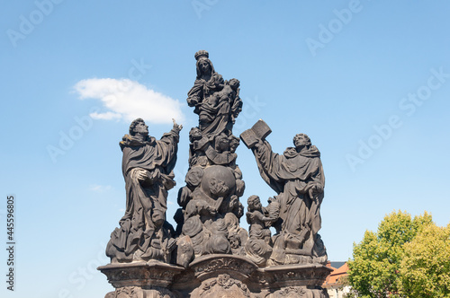Sculpture of Madonna with Saint Dominic and St Thomas Aquinas in Prague photo