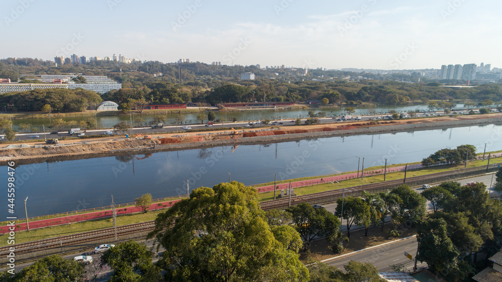 View of Marginal Pinheiros with the Pinheiros river and modern buildings in Sao Paulo, Brazil. With a place to do aquatic exercises in São Paulo