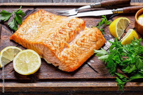 Photography grilled salmon fillet on a wooden cutting board