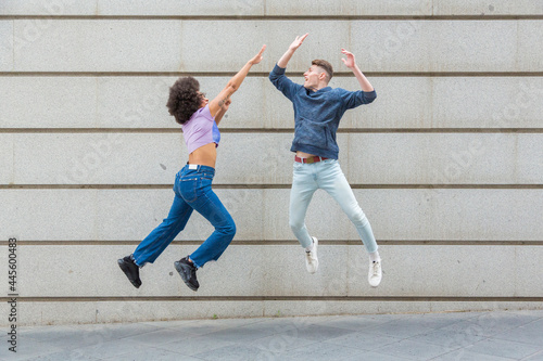 two people jumping