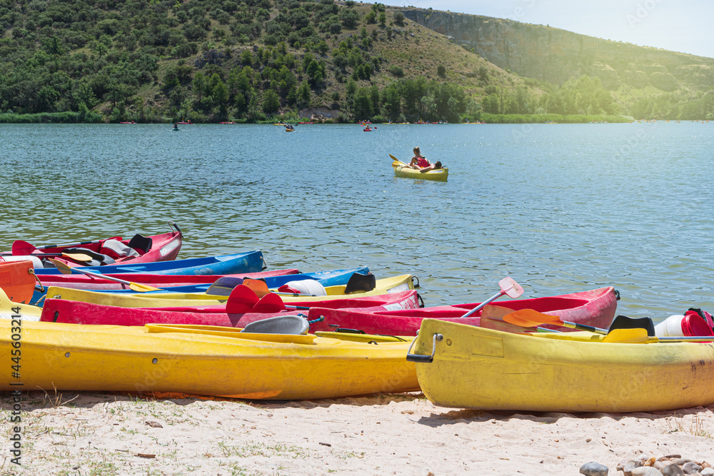 Fototapeta premium Canoe on the shore outdoor water sport in a river healthy lifestyle