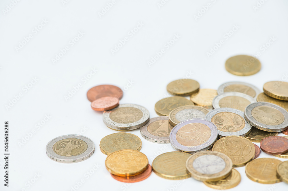 Euro coins and cents against white background with copy space for any text Euro coins and cents against white background with copy space for any text
