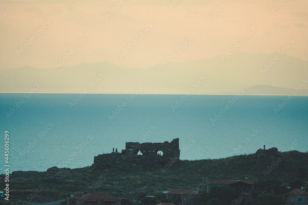 An old castle with sea view on top of the mountain