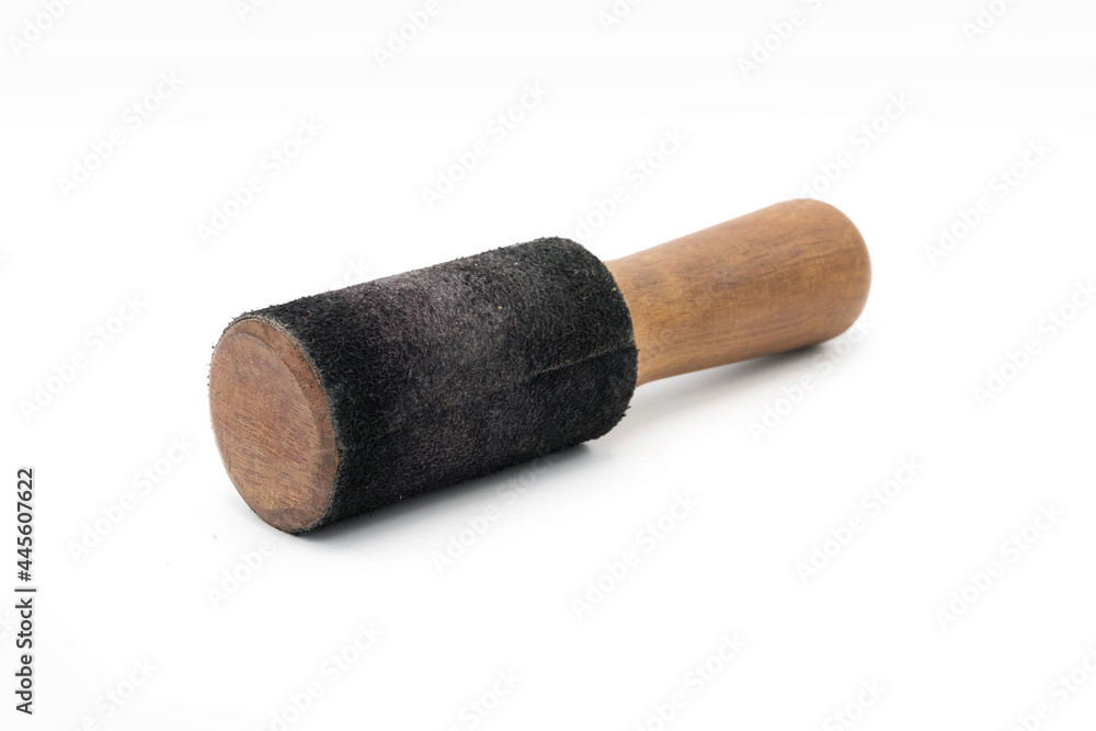 A large stick for a Tibetan Singing Bowl. Isolated on a White background