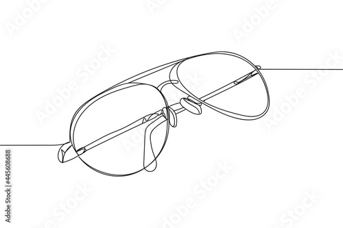 Continuous one line of elegant sunglasses in silhouette on a white background. Linear stylized.Minimalist.