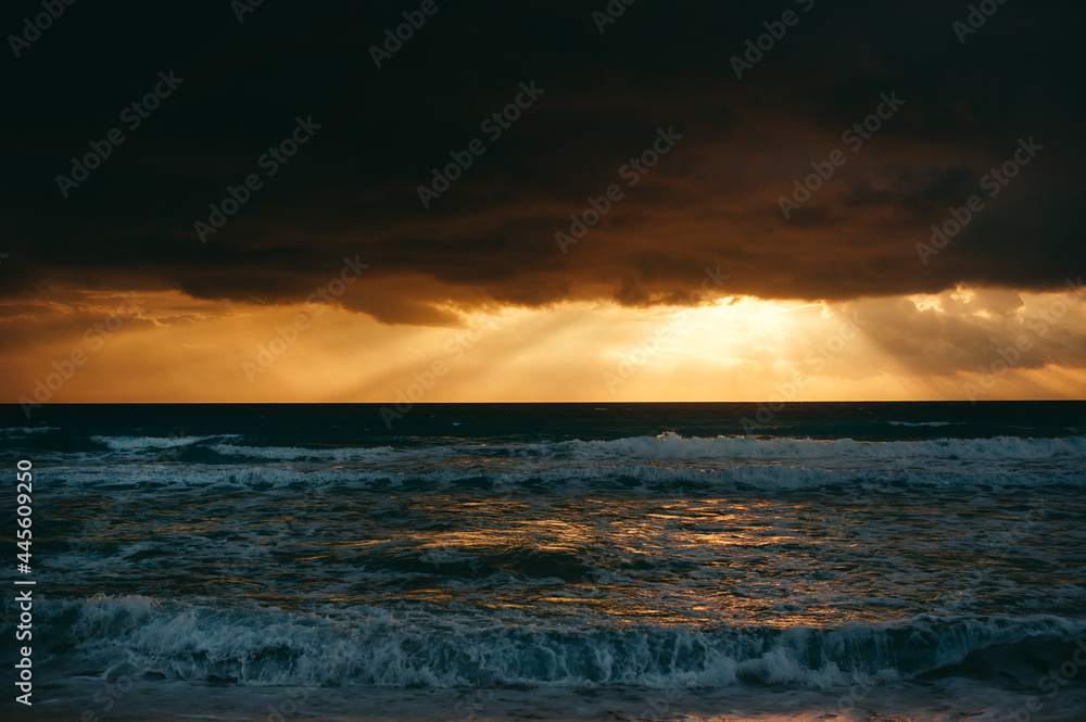 Landscape of amazing sunset, sunrise over the sea with dramatic sky clouds. Sunrise shot on the beach Landscape of amazing sunset, sunrise over the sea with dramatic sky clouds. Sunrise shot on the beach
