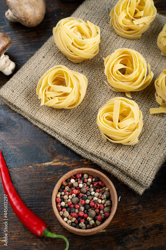 Italian rolled fresh fettuccine pasta. Italian food concept.