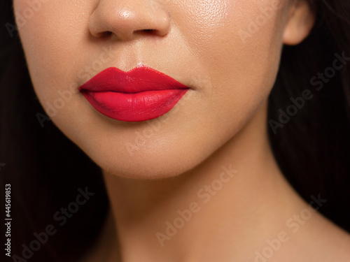 Closeup plump Lips. Lip Care  Fillers. Macro photo with Face detail. Natural shape with perfect contour. Close-up perfect red lip makeup beautiful female mouth. Plump sexy full red lips