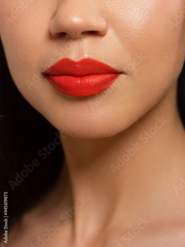 Closeup plump Lips. Lip Care, Fillers. Macro photo with Face detail. Natural shape with perfect contour. Close-up perfect red lip makeup beautiful female mouth. Plump sexy full red lips