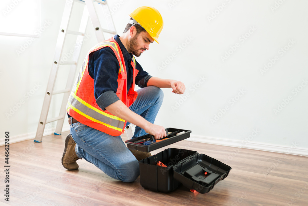 Male engineer bringing his tools to work Male engineer bringing his tools to work