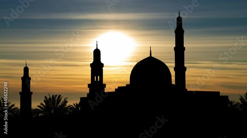 Muscat, Oman: Sultan Qaboos Grand Mosque Silhouette, Time Lapse at Sunset photo