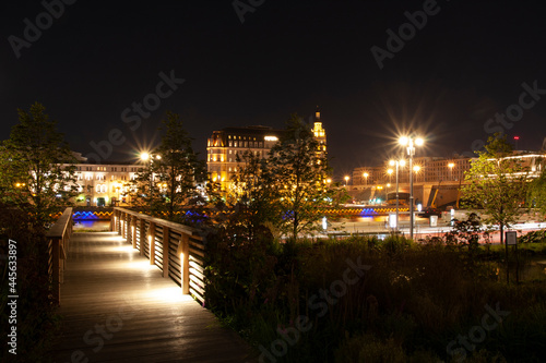 wooden bridge in the night city park.