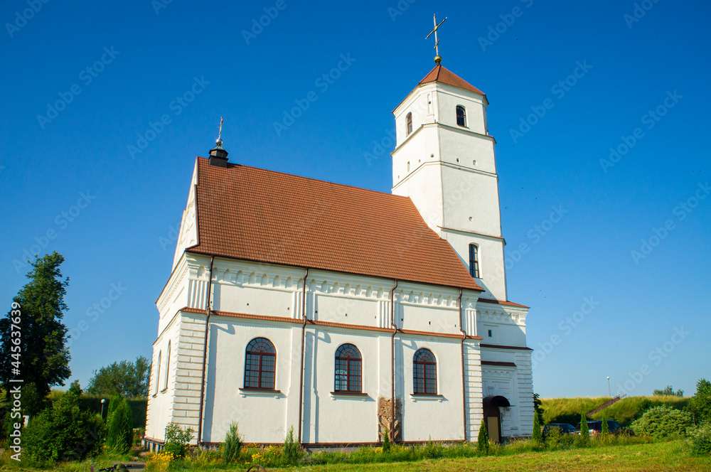 Fototapeta premium Old medieval church of the 17th century in Romanesque architecture