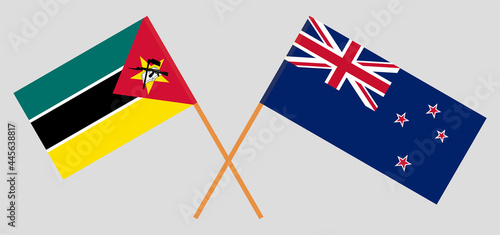 Crossed flags of Mozambique and New Zealand. Official colors. Correct proportion