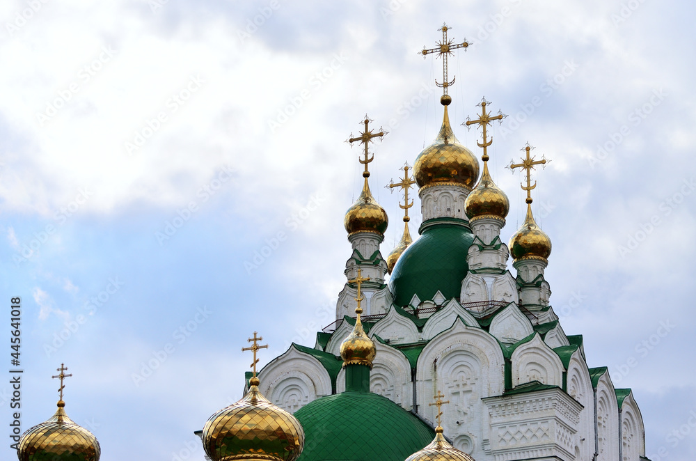 Golden domes with crosses of the Orthodox Church. Russia Yoshkar Ola 01.05.2021. High quality photo