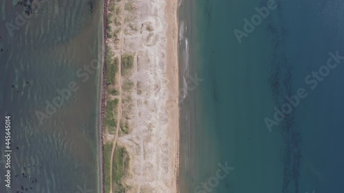 View from a drone vertically down at dawn to the Nazimov sand spit, Russia photo