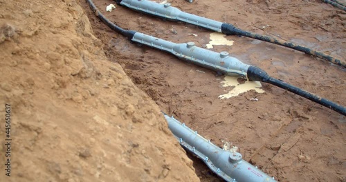 Wallpaper Mural Cables with think connections all over the ground, laying of the cables, 4k Torontodigital.ca