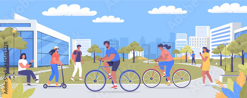 People walking and riding bicycles on the city street