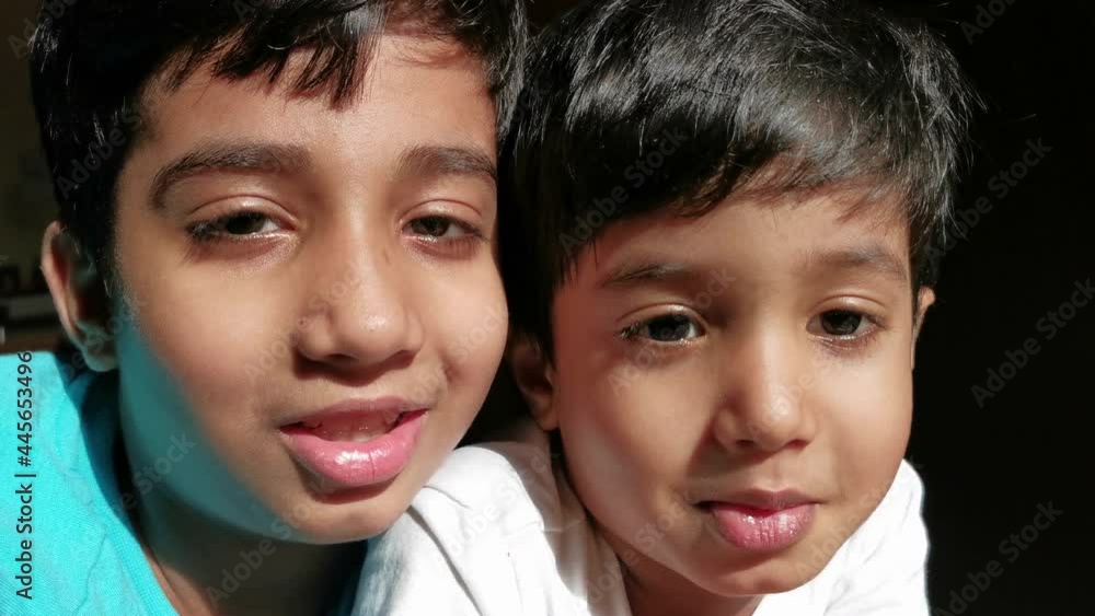 Two little smiling children looking at camera. Brotherhood Two little smiling children looking at camera. Brotherhood