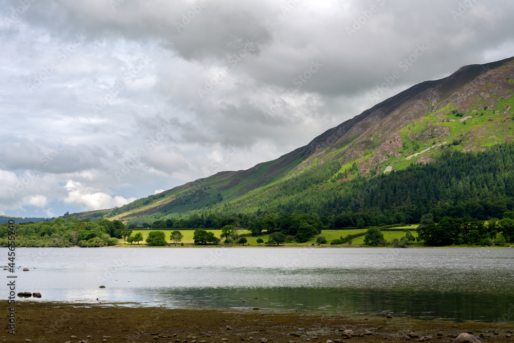View of Bassenthwaite Lake  surrounded by hills on a cloudy summer afternoon, Lake district, England