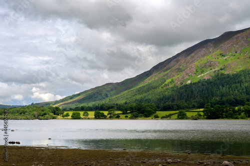 View of Bassenthwaite Lake surrounded by hills on a cloudy summer afternoon, Lake district, England