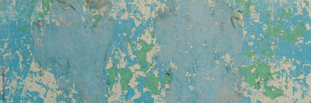 Peeling paint on the wall. Panorama of a concrete wall with old cracked flaking paint. Weathered rough painted surface with patterns of cracks and peeling. Wide panoramic texture for grunge background Peeling paint on the wall. Panorama of a concrete wall with old cracked flaking paint. Weathered rough painted surface with patterns of cracks and peeling. Wide panoramic texture for grunge background