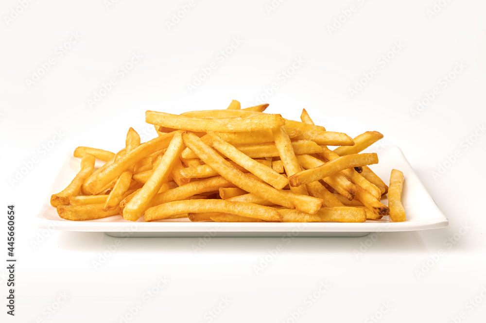French fries in white plate on white background. French fries in white plate on white background.