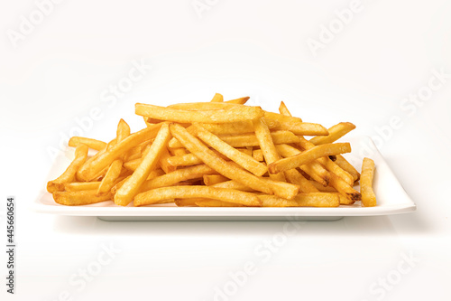 French fries in white plate on white background.