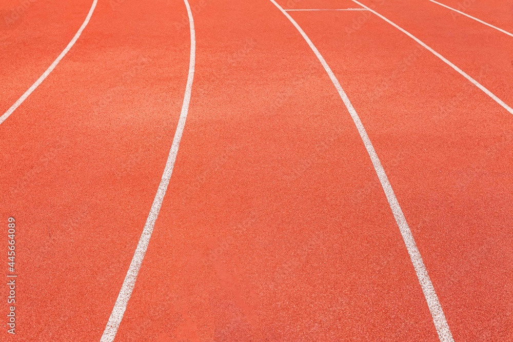The curved lane in running track or athlete track in stadium. Running track is a rubberized artificial running surface for track and field athletics