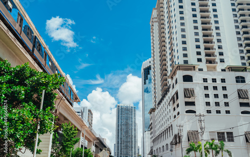 Photography city buildings metro train sky blue clouds white Miami Florida usa