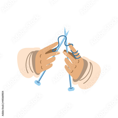hands with needles and wool