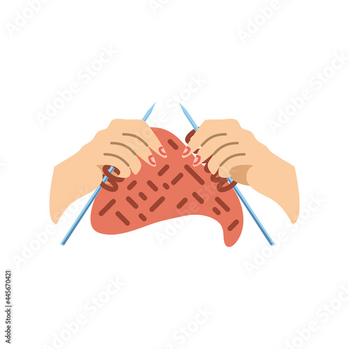 closeup of hands knitting