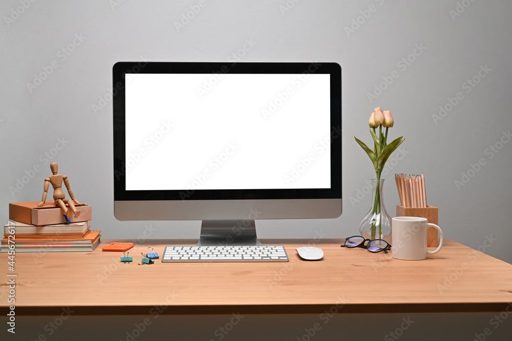 Modern workplace with computer and personal equipment on wooden desk. Modern workplace with computer and personal equipment on wooden desk.