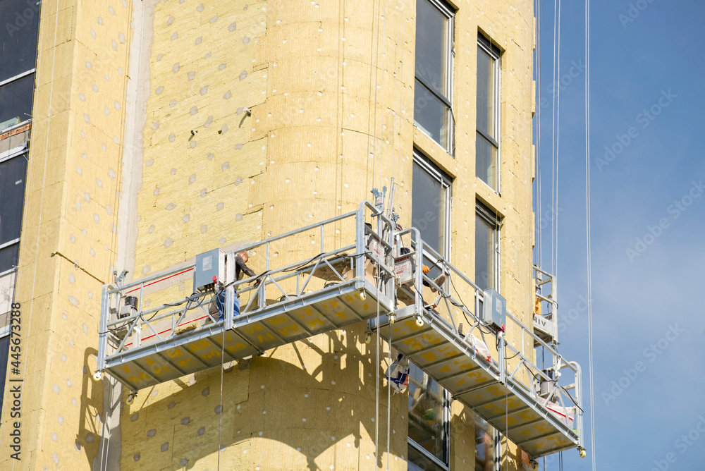 Building external wall thermal insulation with mineral wool. Exterior