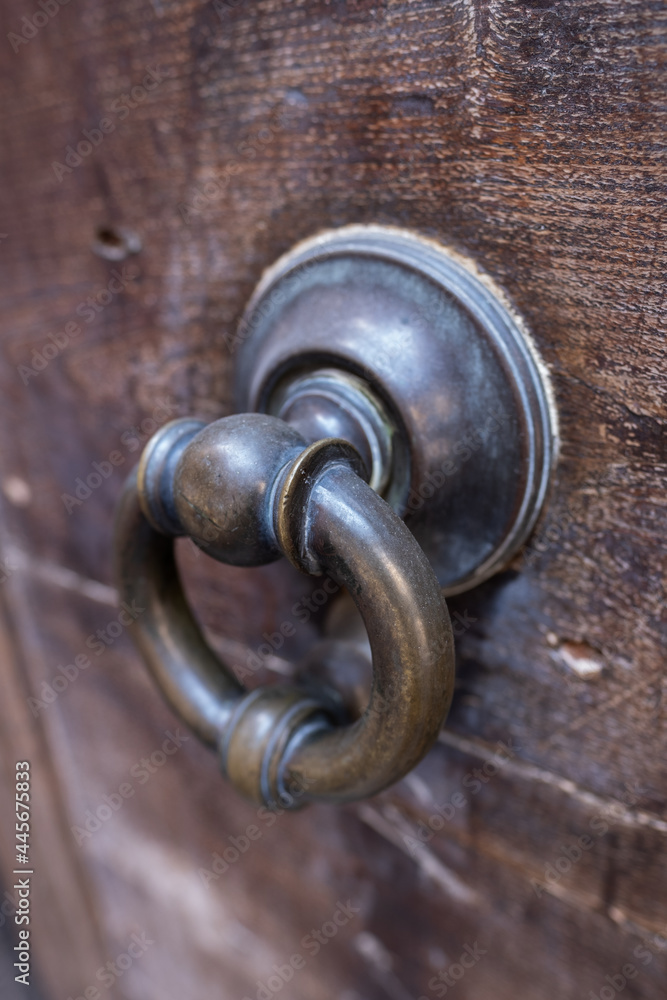 Ancient italian door handle close-up Ancient italian door handle close-up
