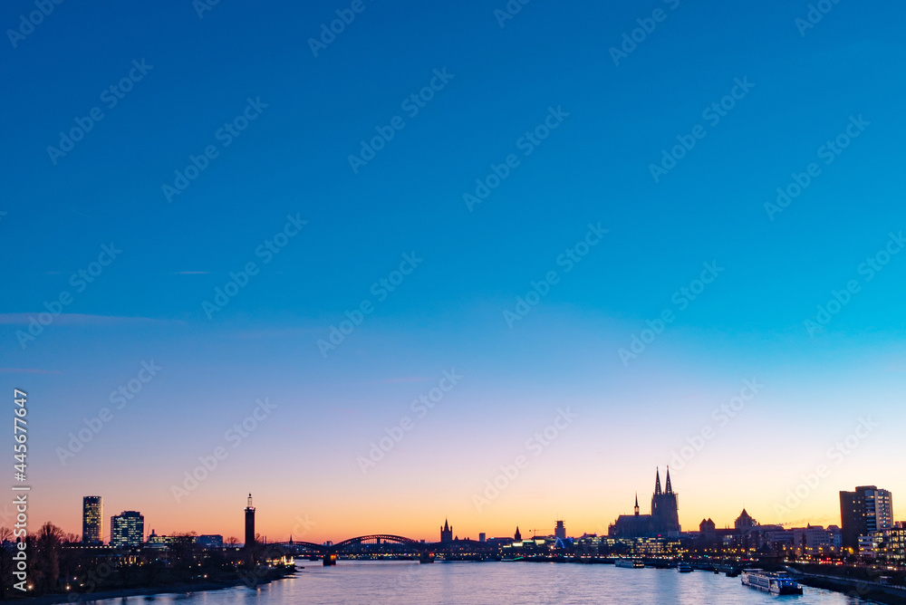 Dusk, Rhine in Cologne, Germany, Cologne Cathedral, World Heritage, long shot Dusk, Rhine in Cologne, Germany, Cologne Cathedral, World Heritage, long shot