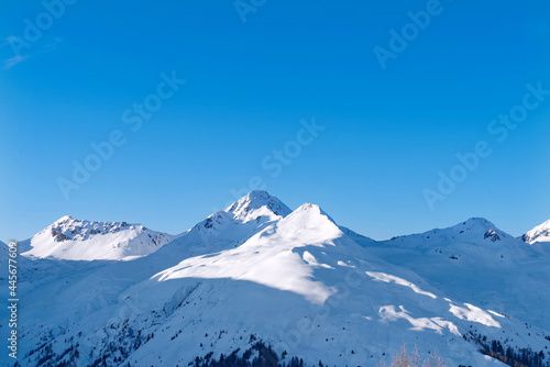 Fototapeta Naklejka Na Ścianę i Meble -  Switzerland, Alps, under the blue sky, thick snow on the top of the mountain, beautiful mountain scenery, panoramic shot