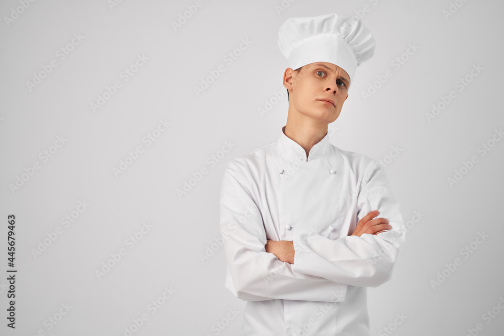 man in chef's clothes professional kitchen work