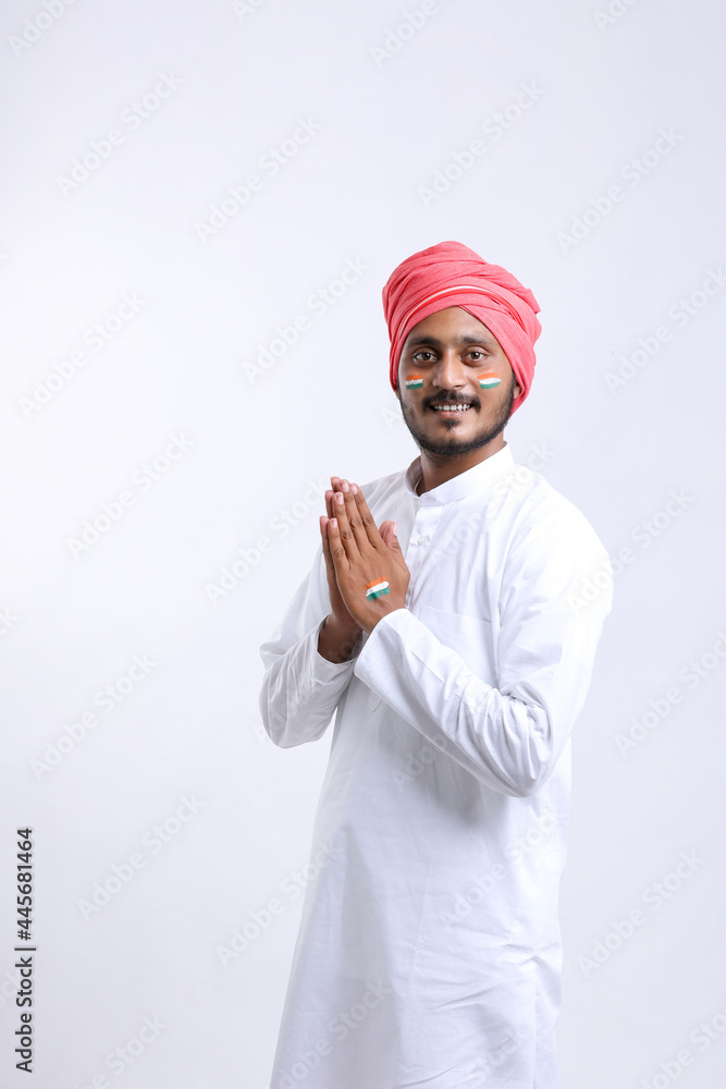 Young indian man giving namaste or welcome gesture. Young indian man giving namaste or welcome gesture.