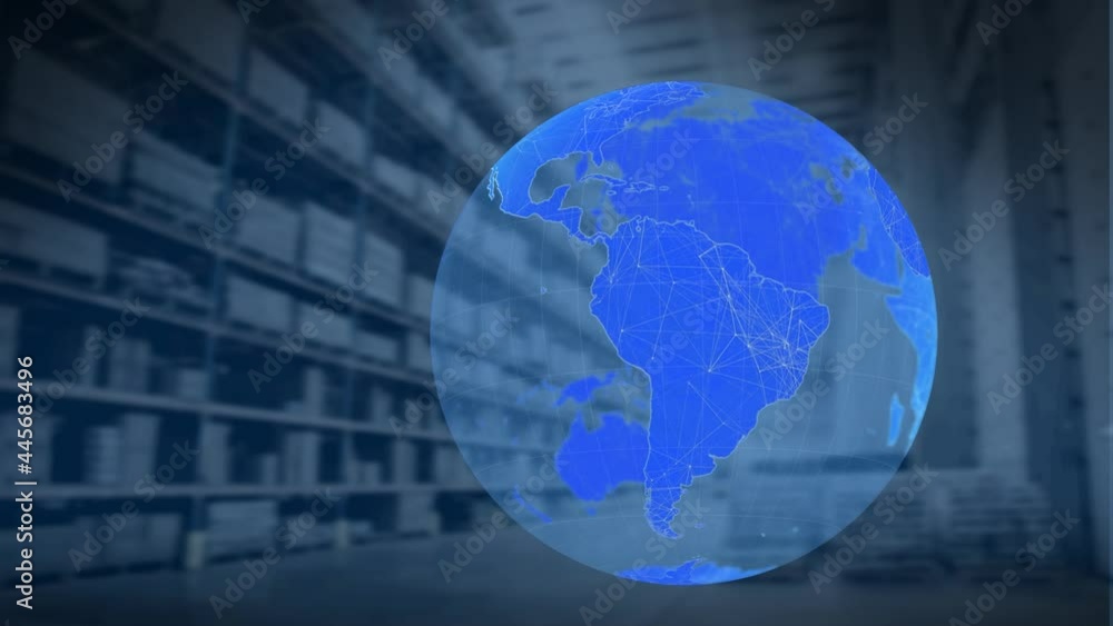Digital composition of globe spinning against warehouse in background Digital composition of globe spinning against warehouse in background