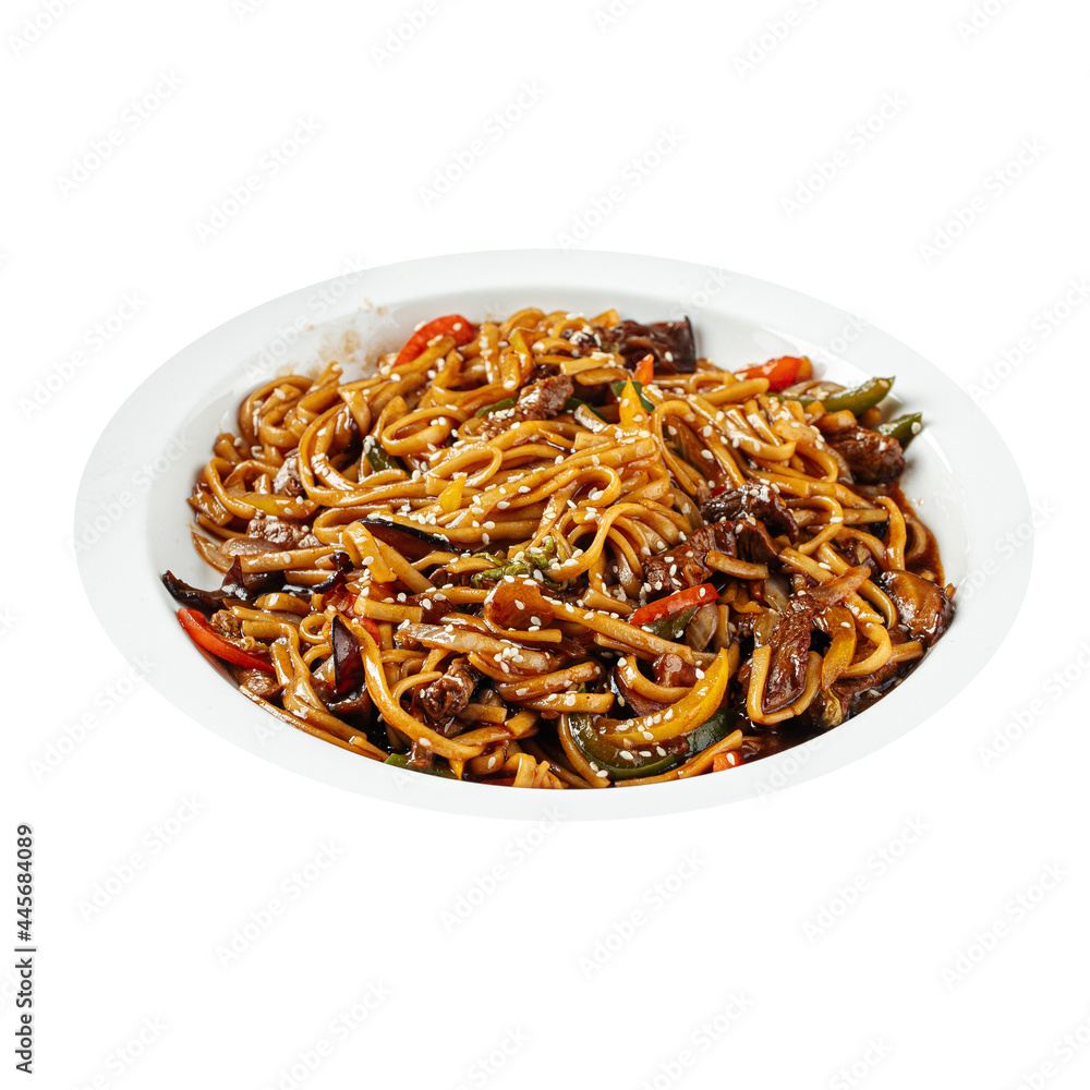Isolated portion of udon noodles with vegetables and meat Isolated portion of udon noodles with vegetables and meat