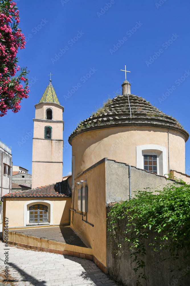 Fototapeta premium The dome and bell tower of a church in Torrecuso, an old town in the province of Benevento, Italy