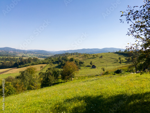 Scenic view of hilly countryside in village of Gornji Osje  ani near Doboj during clear sunny summer day.