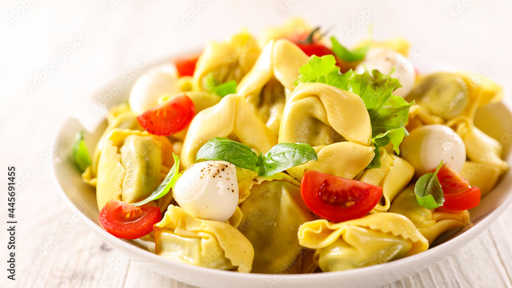 tortellini with mozzarella,  tomato and basil