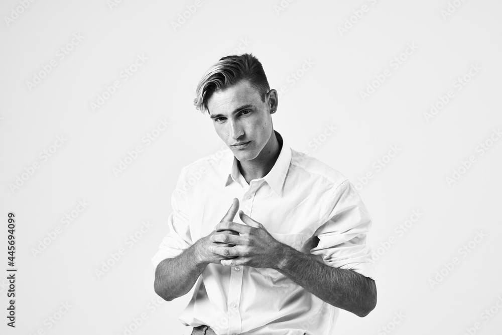man in white shirt and pants fashion hairstyle lifestyle studio portrait